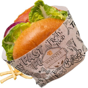 Custom printed greaseproof food basket liner paper holding a burger and French fries