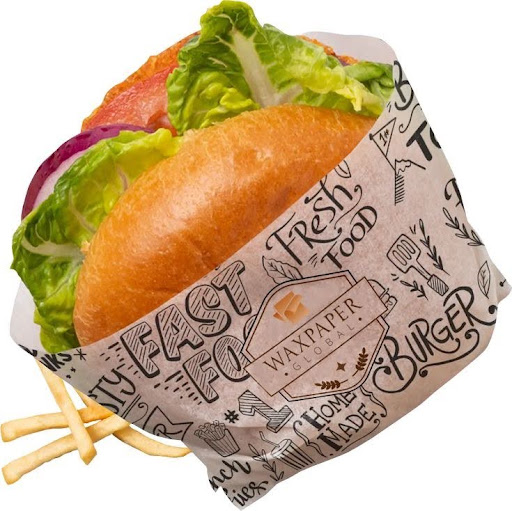 Custom printed greaseproof food basket liner paper holding a burger and French fries